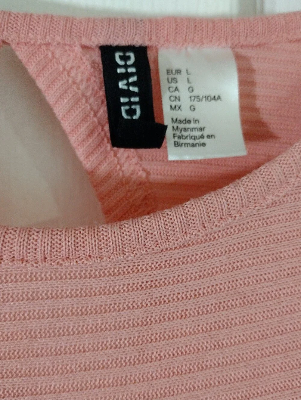 Divided Pink Ribbed Long Sleeve Sweater distinctive cut-out back design